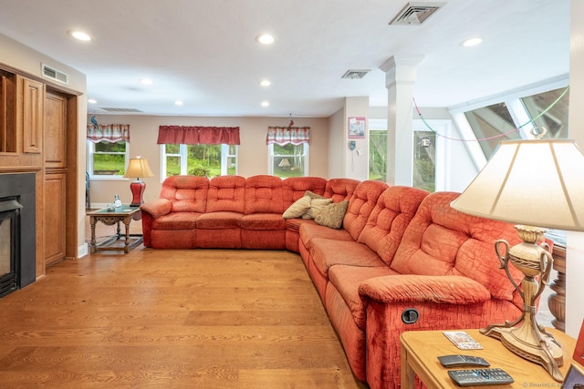 79 Ben Whitney Ln, Bridgewater, CT 06752 - living room with light wood-style flooring, recessed lighting, and a fireplace