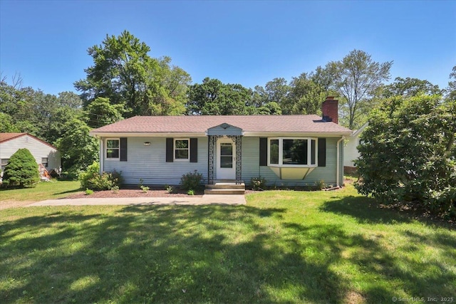 57 Lakeview Hts, Lebanon, CT 06249 - single story home with a chimney and a front yard