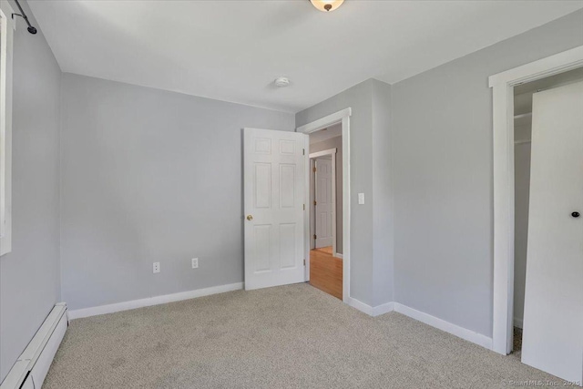 57 Lakeview Hts, Lebanon, CT 06249 - unfurnished bedroom with a baseboard heating unit and carpet floors
