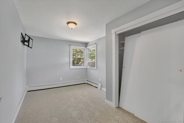 57 Lakeview Hts, Lebanon, CT 06249 - unfurnished bedroom with a baseboard heating unit and carpet
