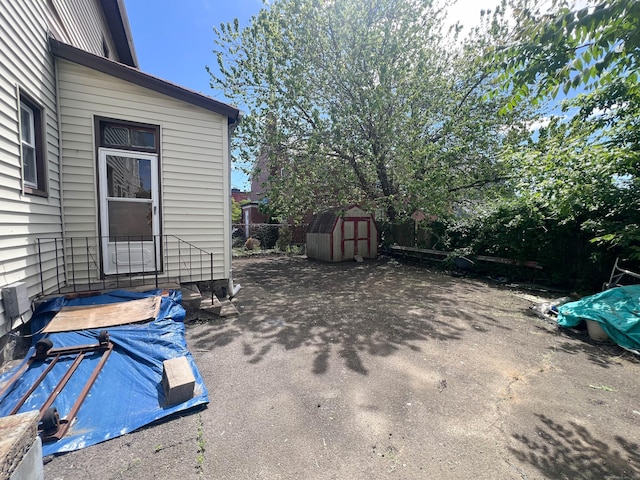 57 Milne St, Bridgeport, CT 06605 - view of patio / terrace featuring a storage shed
