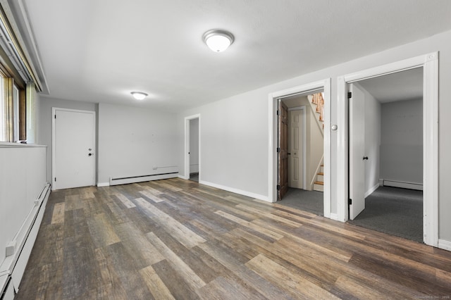 41 Laurel Leaf Dr, Ledyard, CT 06335 - basement with a baseboard radiator, stairway, and wood finished floors