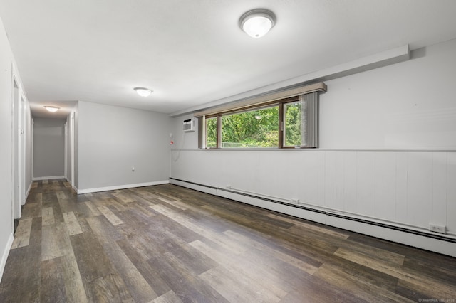 41 Laurel Leaf Dr, Ledyard, CT 06335 - spare room with a baseboard radiator, wood finished floors, and a wall unit AC