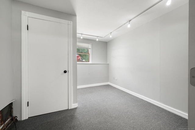 41 Laurel Leaf Dr, Ledyard, CT 06335 - empty room with rail lighting and carpet flooring