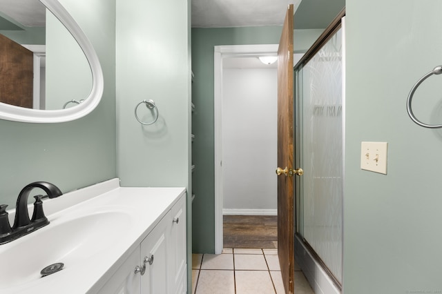 41 Laurel Leaf Dr, Ledyard, CT 06335 - bathroom featuring a shower with shower door, vanity, and tile patterned flooring