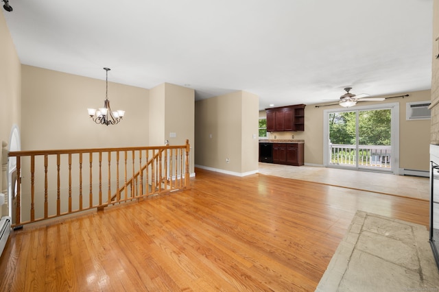41 Laurel Leaf Dr, Ledyard, CT 06335 - unfurnished living room with a chandelier, light wood-type flooring, a ceiling fan, an AC wall unit, and a baseboard radiator