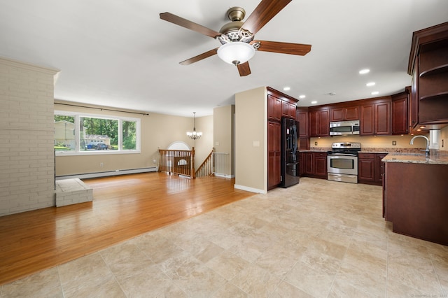 41 Laurel Leaf Dr, Ledyard, CT 06335 - kitchen with stainless steel appliances, baseboard heating, open shelves, ceiling fan, and a chandelier