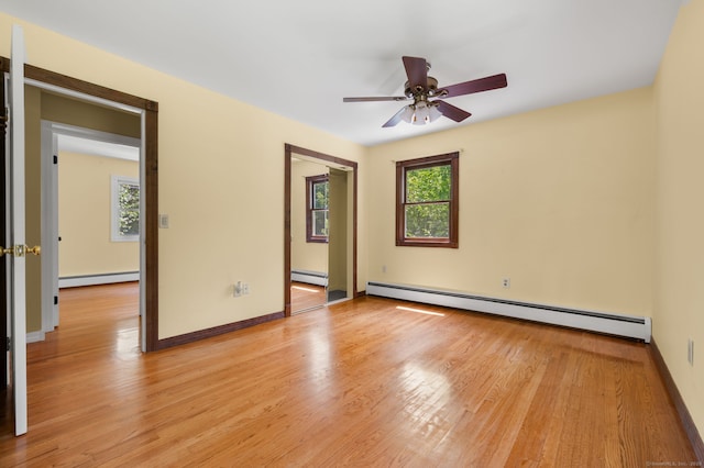 41 Laurel Leaf Dr, Ledyard, CT 06335 - unfurnished room with a baseboard heating unit, light wood-style flooring, and ceiling fan