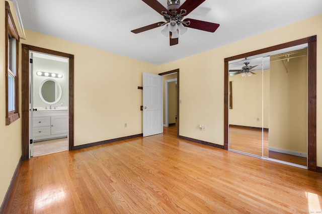 41 Laurel Leaf Dr, Ledyard, CT 06335 - unfurnished bedroom featuring light wood-type flooring, a closet, ensuite bath, and ceiling fan