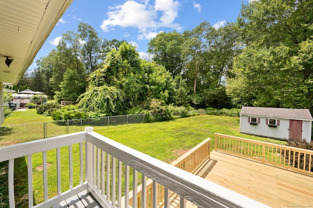 41 Laurel Leaf Dr, Ledyard, CT 06335 - wooden deck featuring an outbuilding, a fenced backyard, and view of wooded area
