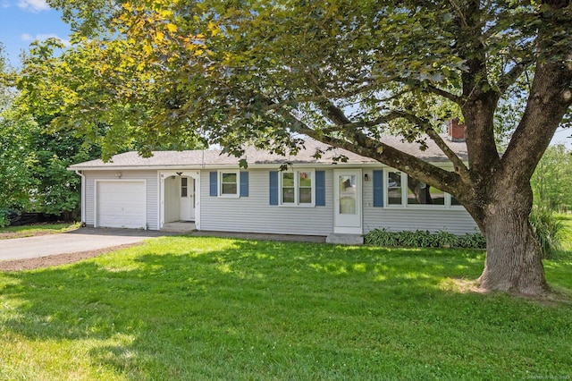 75 Atwood Hts, Thomaston, CT 06787 - view of front of property featuring asphalt driveway, a front lawn, and an attached garage