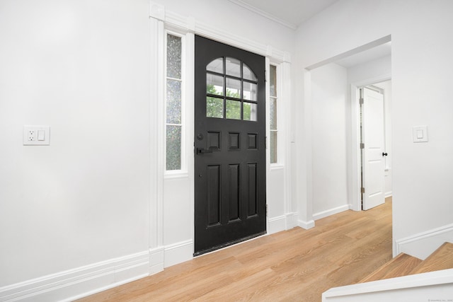 105 High St, Sprague, CT 06330 - entrance foyer featuring wood finished floors and baseboards
