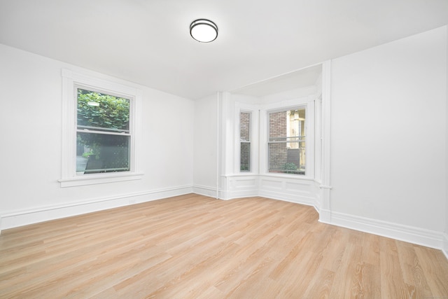 105 High St, Sprague, CT 06330 - unfurnished room with wood finished floors and baseboards