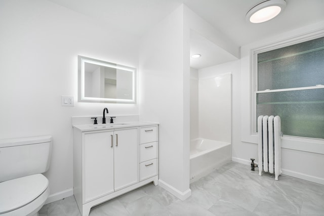 105 High St, Sprague, CT 06330 - bathroom featuring radiator, marble look tiles, vanity, and shower / washtub combination