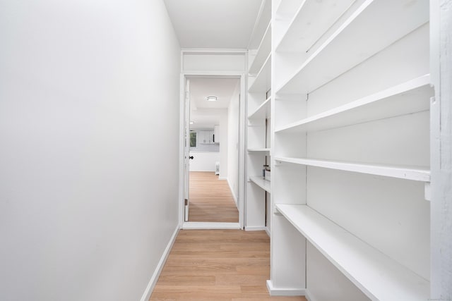 105 High St, Sprague, CT 06330 - hall with light wood-style flooring and baseboards