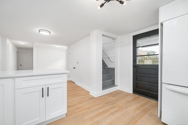 105 High St, Sprague, CT 06330 - entryway with stairway and light wood-type flooring