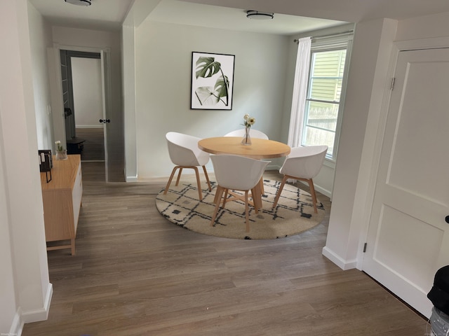 105 High St, Sprague, CT 06330 - dining room with baseboards and wood finished floors