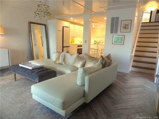350 Grovers Ave Unit 11A, Bridgeport, CT 06605 - living area featuring stairway, recessed lighting, and ornate columns