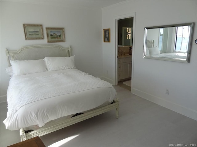 350 Grovers Ave Unit 11A, Bridgeport, CT 06605 - bedroom featuring ensuite bath, carpet, and crown molding