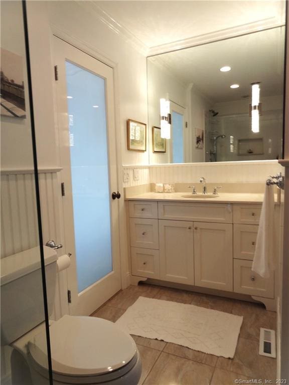 350 Grovers Ave Unit 11A, Bridgeport, CT 06605 - full bathroom with vanity, a shower with door, tile patterned floors, and crown molding