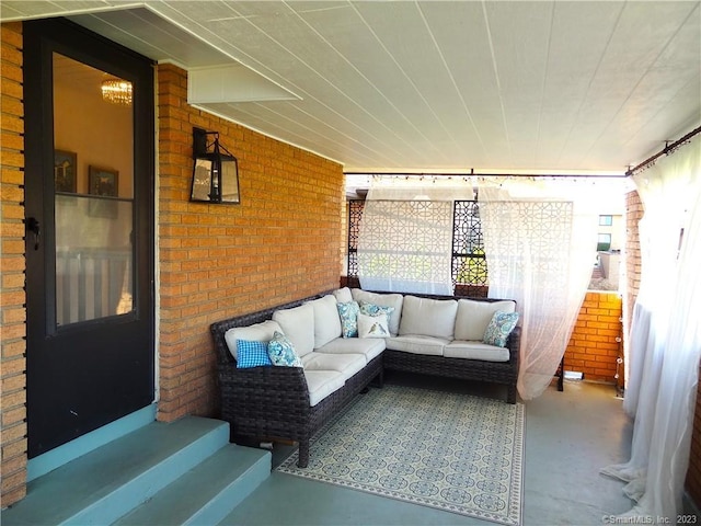 350 Grovers Ave Unit 11A, Bridgeport, CT 06605 - sunroom with outdoor lounge area, entry steps, and a chandelier