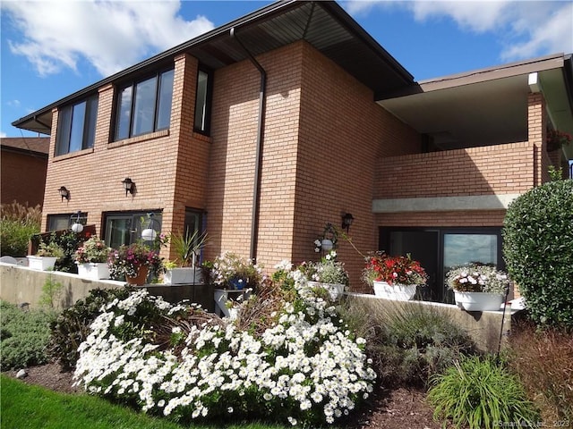 350 Grovers Ave Unit 11A, Bridgeport, CT 06605 - view of home's exterior with brick siding