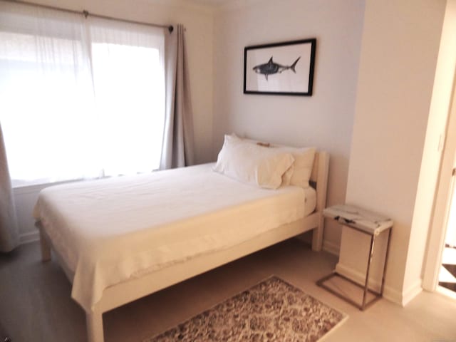 350 Grovers Ave Unit 11A, Bridgeport, CT 06605 - bedroom featuring multiple windows
