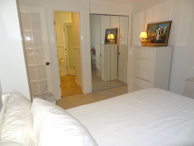 350 Grovers Ave Unit 11A, Bridgeport, CT 06605 - bedroom featuring a closet and connected bathroom