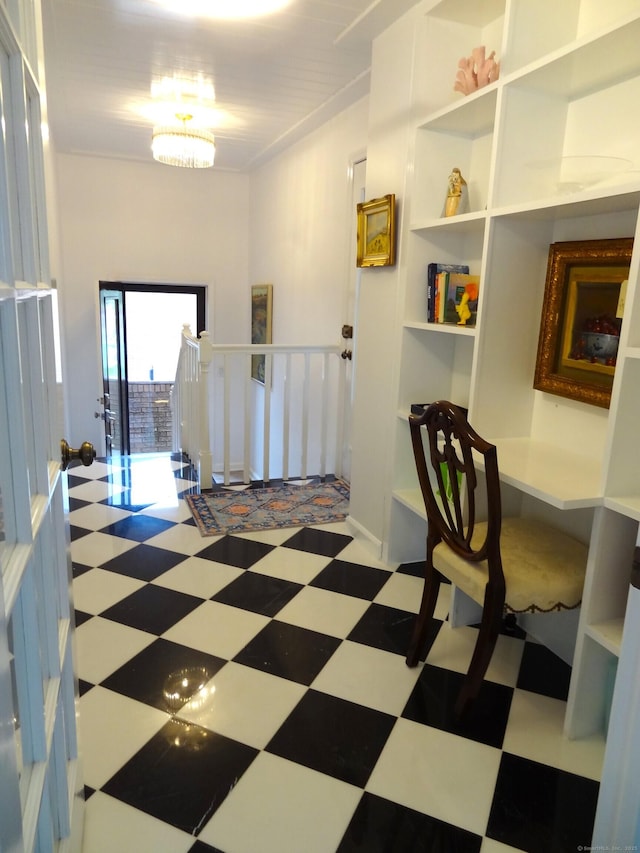 350 Grovers Ave Unit 11A, Bridgeport, CT 06605 - corridor with tile patterned floors and a chandelier