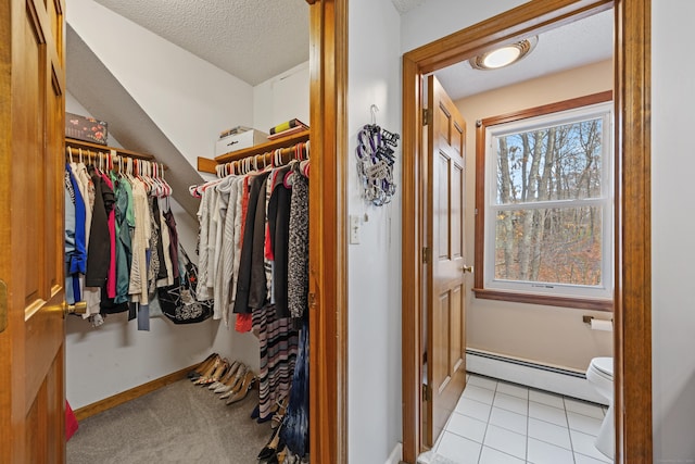 10 Heritage Dr, Prospect, CT 06712 - walk in closet featuring baseboard heating and light tile patterned flooring