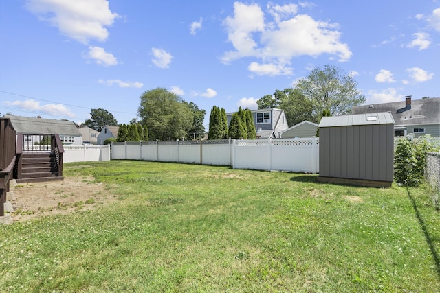 15 Burdette Pl, Milford, CT 06460 - fenced backyard with a storage unit