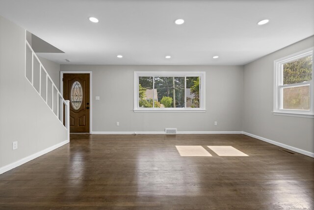 15 Burdette Pl, Milford, CT 06460 - foyer entrance with healthy amount of natural light, stairway, dark wood finished floors, and recessed lighting
