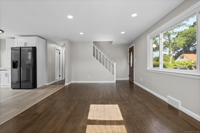 15 Burdette Pl, Milford, CT 06460 - unfurnished living room featuring dark wood finished floors, stairs, and recessed lighting