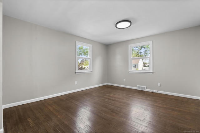 15 Burdette Pl, Milford, CT 06460 - unfurnished room featuring healthy amount of natural light and dark wood-style floors