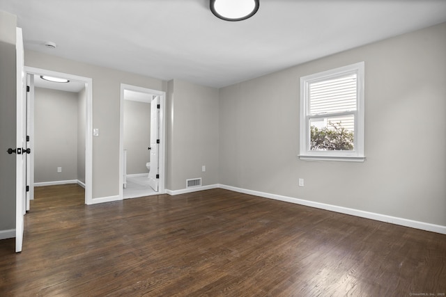 15 Burdette Pl, Milford, CT 06460 - empty room featuring dark wood-type flooring and a smoke detector