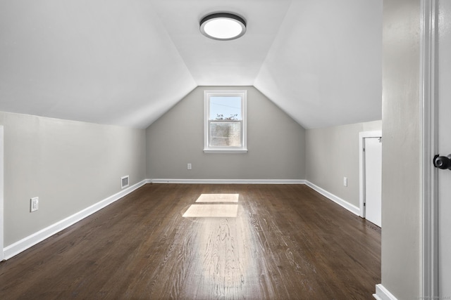 15 Burdette Pl, Milford, CT 06460 - additional living space featuring dark wood-type flooring and vaulted ceiling