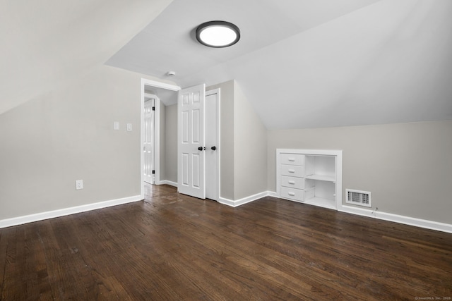 15 Burdette Pl, Milford, CT 06460 - additional living space with dark wood-style floors and vaulted ceiling