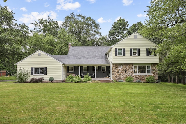 195 Orchard Hill Dr, South Windsor, CT 06074 - view of front of property with a porch, a front lawn, stone siding, and a chimney