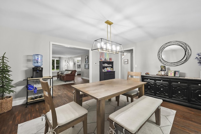 195 Orchard Hill Dr, South Windsor, CT 06074 - dining space featuring wood finished floors and a chandelier