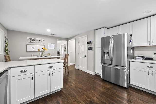 195 Orchard Hill Dr, South Windsor, CT 06074 - kitchen featuring stainless steel refrigerator with ice dispenser, dark wood finished floors, white cabinets, and recessed lighting