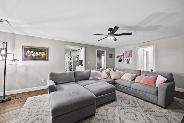195 Orchard Hill Dr, South Windsor, CT 06074 - living room with wood finished floors and a ceiling fan