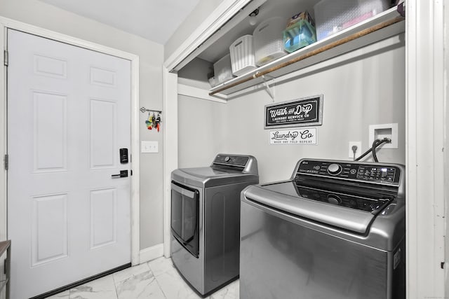 195 Orchard Hill Dr, South Windsor, CT 06074 - washroom featuring washing machine and dryer and light marble finish floors