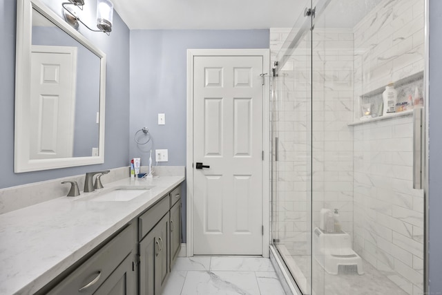 195 Orchard Hill Dr, South Windsor, CT 06074 - bathroom with vanity, marble look tile flooring, and a stall shower
