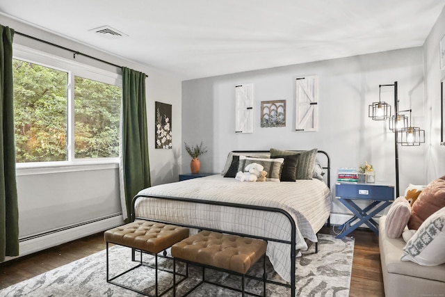 195 Orchard Hill Dr, South Windsor, CT 06074 - bedroom featuring wood finished floors and a baseboard radiator