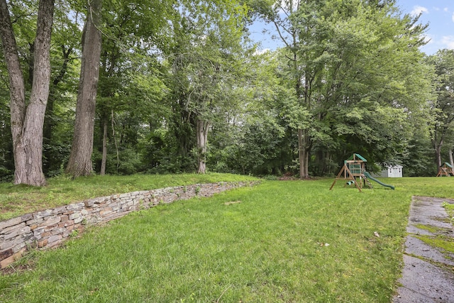 195 Orchard Hill Dr, South Windsor, CT 06074 - view of green lawn featuring a playground