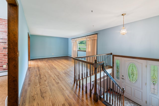 6 Revere Rd, New Milford, CT 06776 - foyer entrance featuring wood finished floors and a baseboard radiator