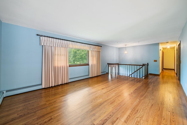 6 Revere Rd, New Milford, CT 06776 - spare room with wood finished floors and baseboard heating