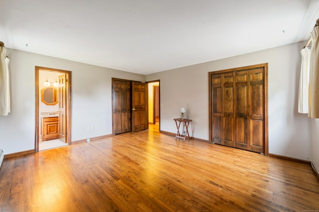 6 Revere Rd, New Milford, CT 06776 - unfurnished bedroom with wood finished floors and connected bathroom