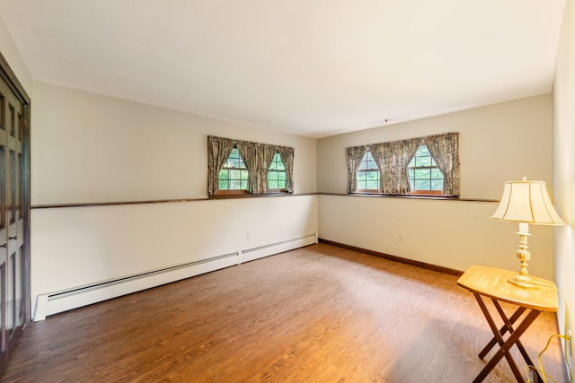 6 Revere Rd, New Milford, CT 06776 - spare room with a baseboard radiator and wood finished floors