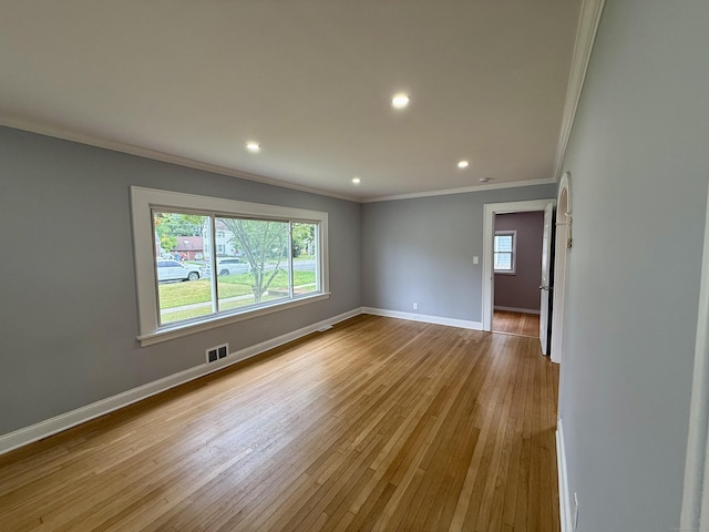 654 Nichols Ave, Stratford, CT 06614 - spare room with ornamental molding, plenty of natural light, hardwood / wood-style floors, and recessed lighting